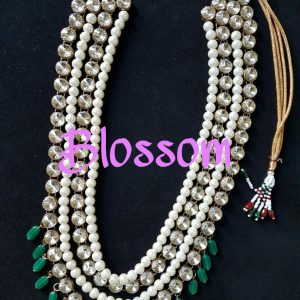 Multi layer Stones neckpeice with emerald drops.