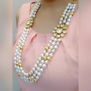 Layers of white Baroque pearls with kundan broach