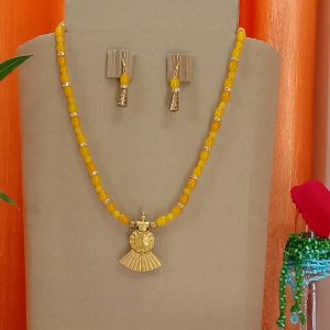 Yellow Glass Beads With Antique Gold Pendent Set