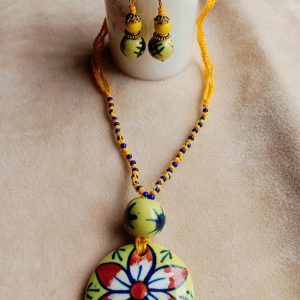 Ceramic neck piece with ear rings