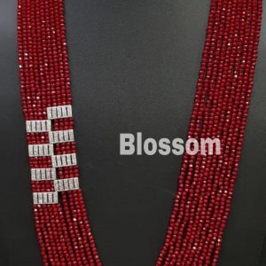 Maroon Crsystals with AD broaches by side